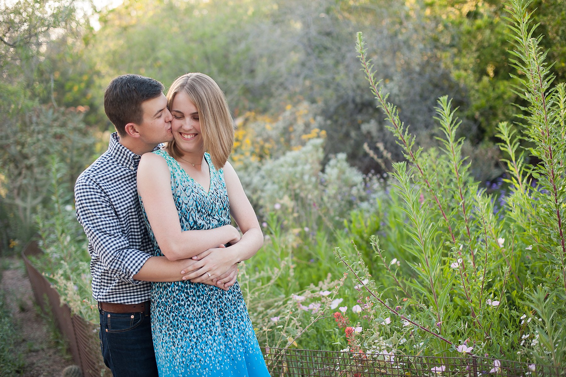 Desert Botanical Gardens Engagement Couple Smiling Embracing Kissing AZ Photographer 