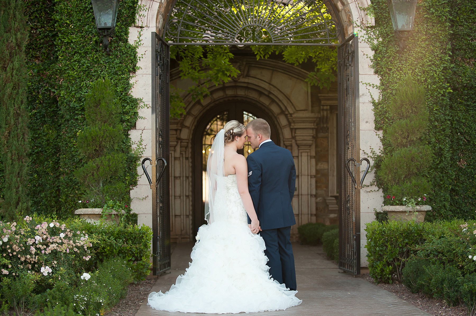Villa Siena Wedding Bride Groom Embracing Smiling Main Entrance Gilbert Arizona Photo