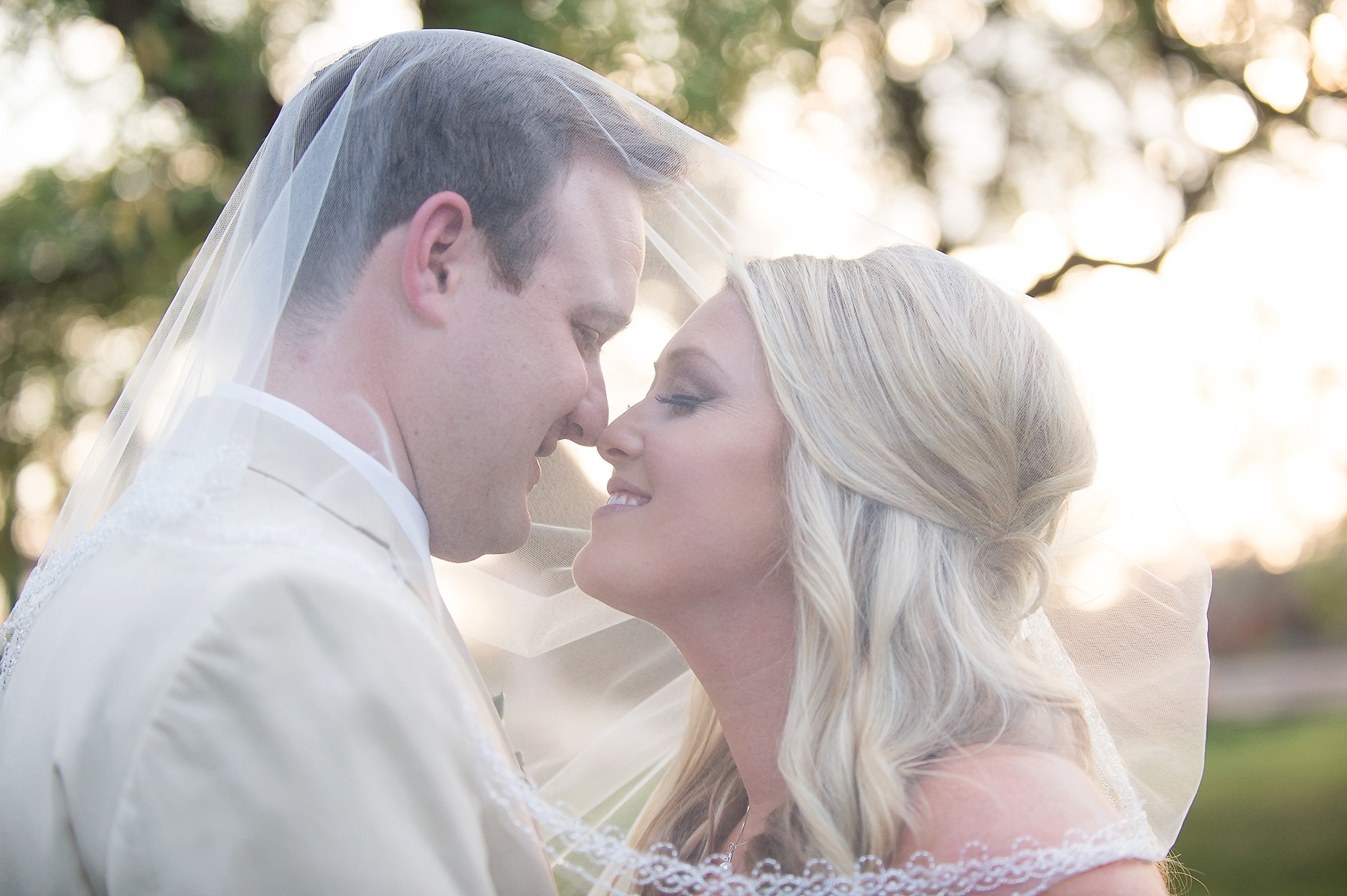 Windmill Winery Wedding Groom Bride Kissing Romantic Smiling Veil Phoenix Arizona Photo