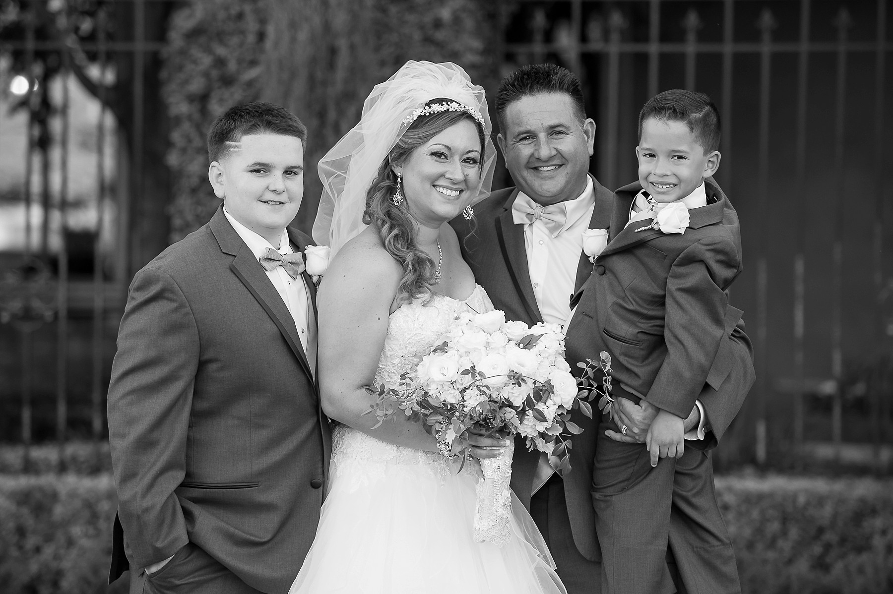 Villa Siena Wedding Bride Groom Embracing Family Smiling Dress Bouquet Gilbert Arizona Photos