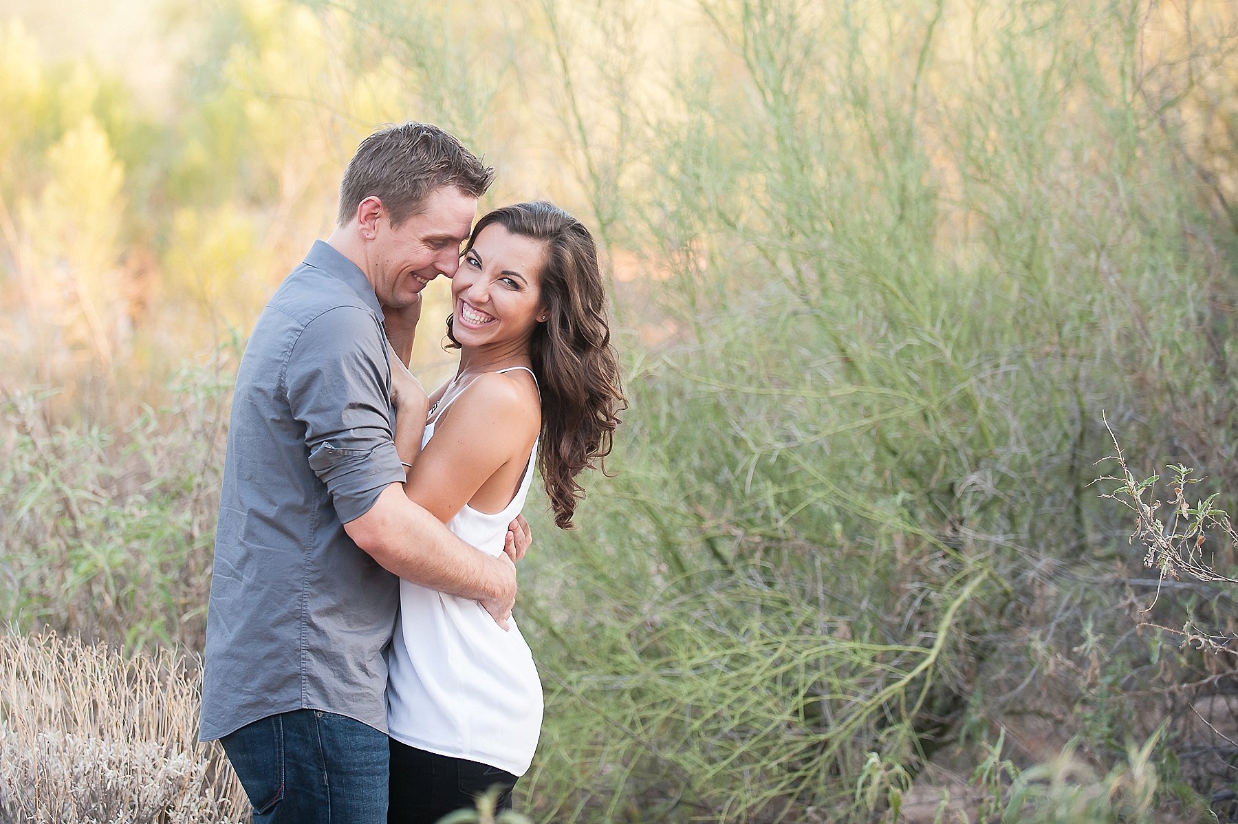 Scottsdale Engagement Couple Smiling Embracing Laughing Desert Gilbert Arizona Photo
