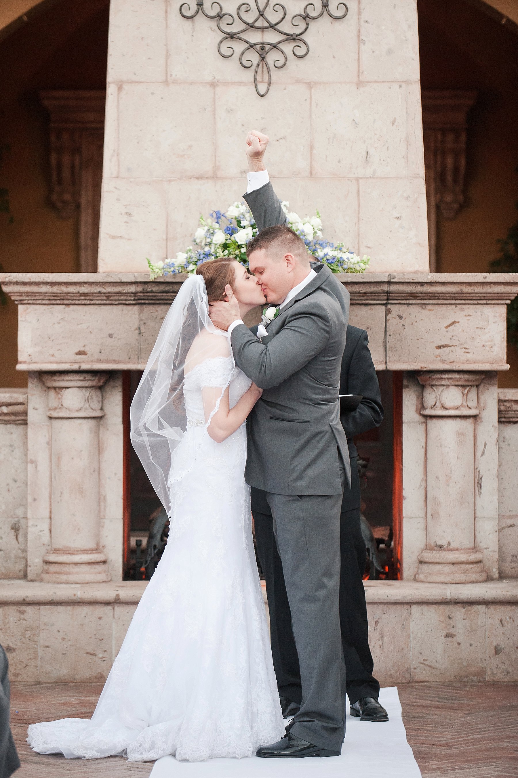 Villa Siena Wedding Ceremony Kiss Fist Pump Gilbert Arizona Photo