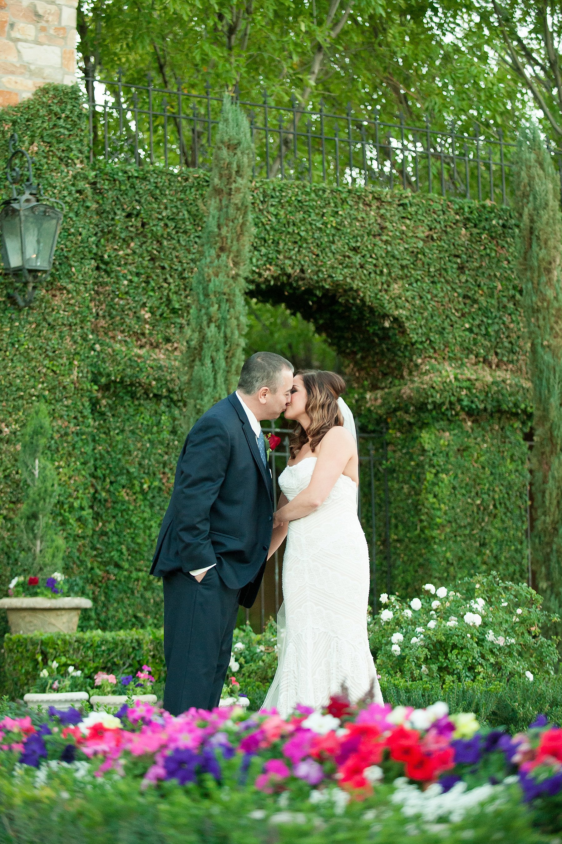 Romantic Villa Siena Wedding Bride Groom Kissing Greenery Gilbert Arizona Photo