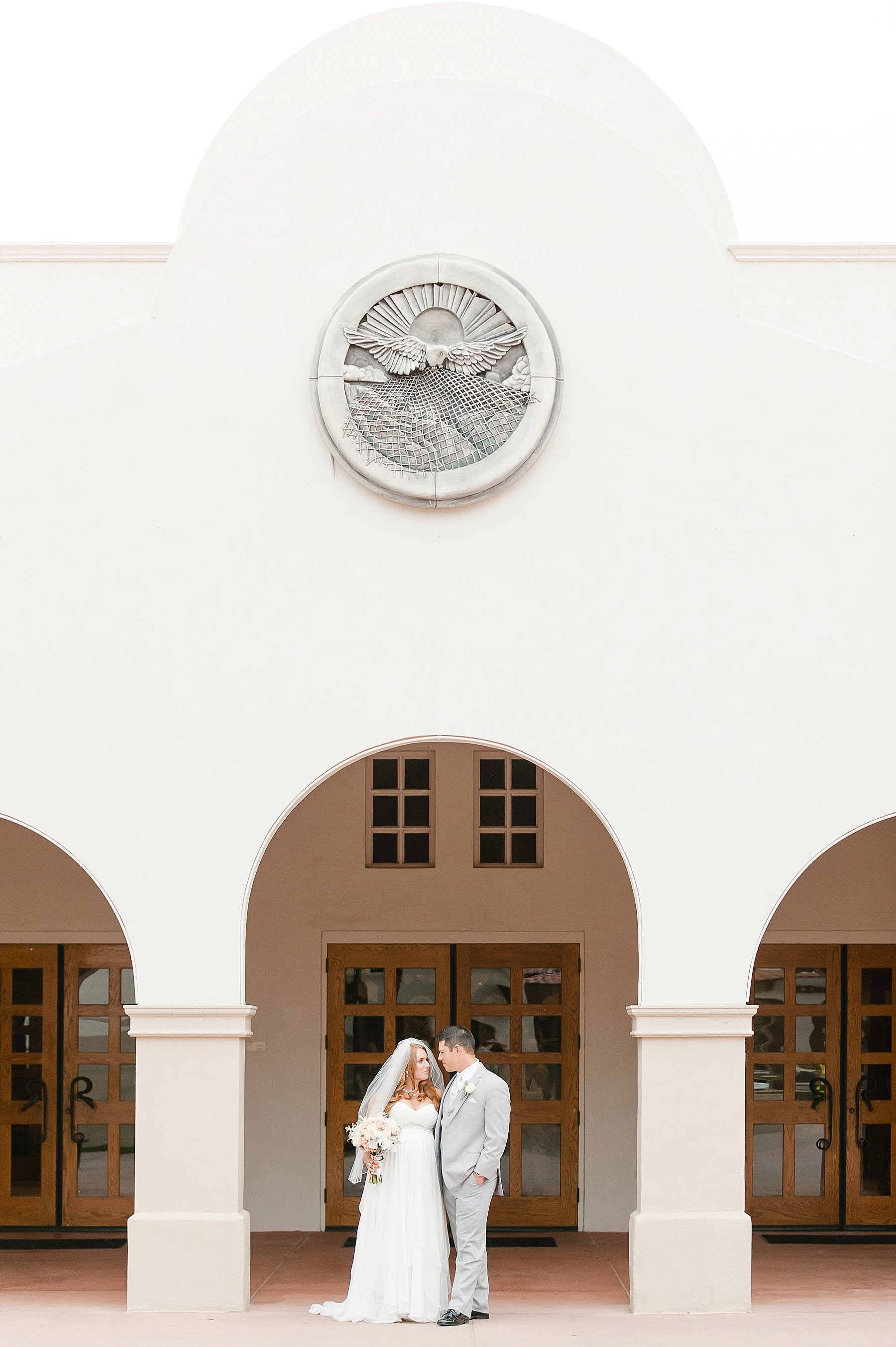 St Andrew the Apostle Church Wedding Couple by Arches Chandler AZ Photo