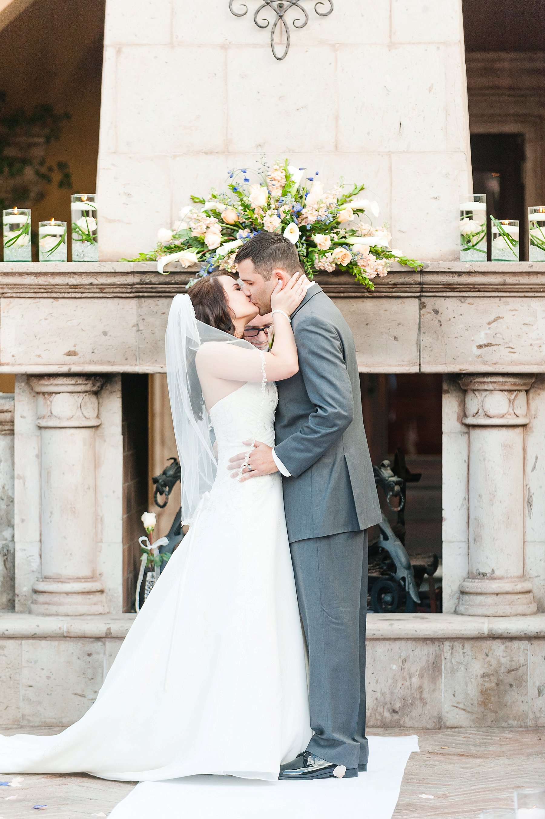 Blue Peach Villa Siena Wedding Ceremony Bride Groom Kissing Gilbert AZ Photo