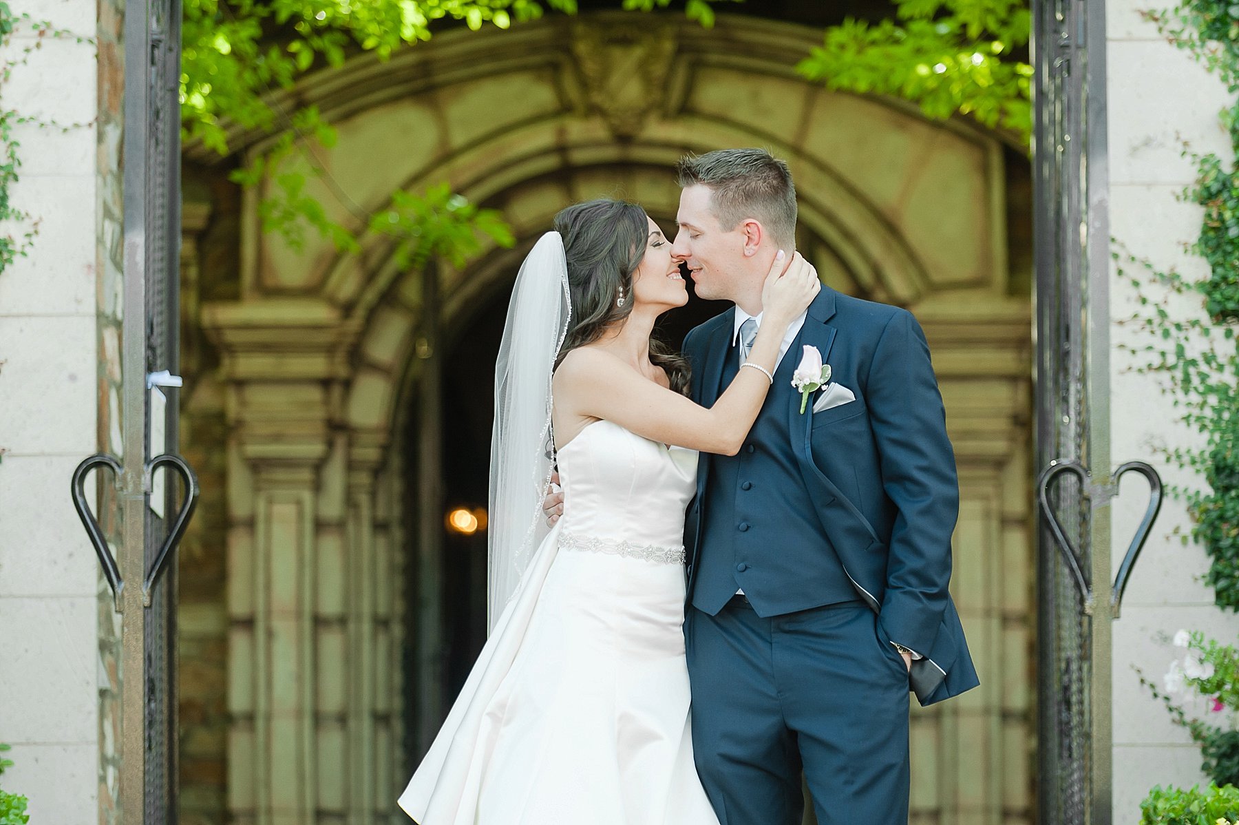 Navy and Gray Villa Siena Wedding Bride Groom Kissing Gilbert AZ Photo