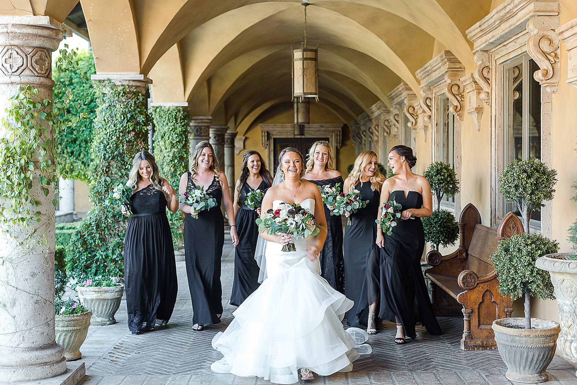 Classic Black and White Wedding Bridesmaids Walking at Villa Siena