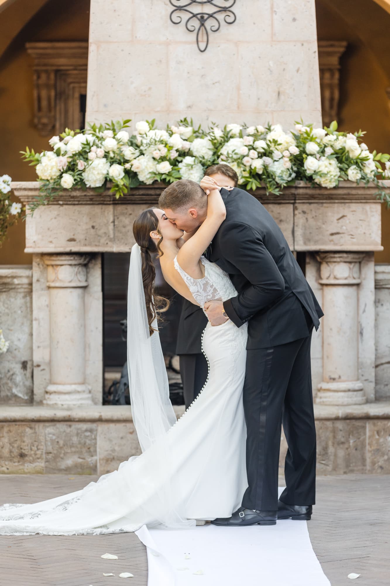 Black and Gold Wedding at Villa Siena Arizona Wedding Photographer bride and groom first kiss